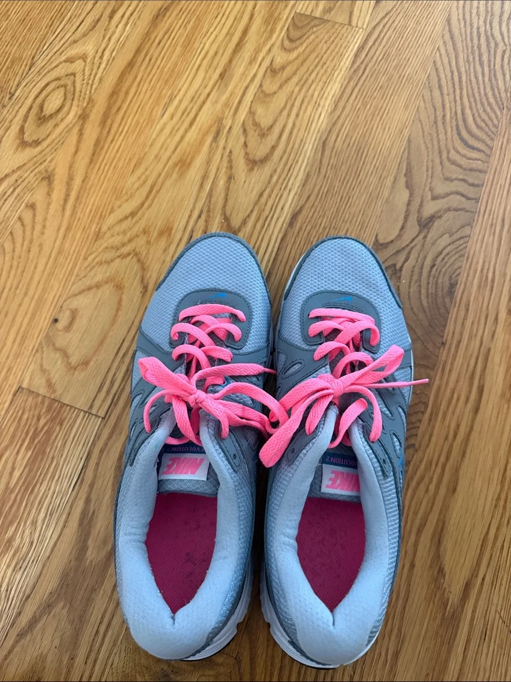 Nike Women's Gray Athletic Sneakers with Pink Laces and Blue Swoosh